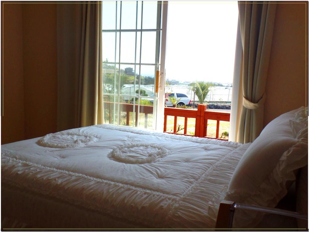 Jubilee Chalet Seogwipo Quarto foto